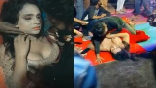 Playing with big boobs of sexy dancer in party