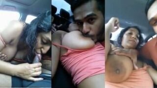 Getting blowjob by office girl in car